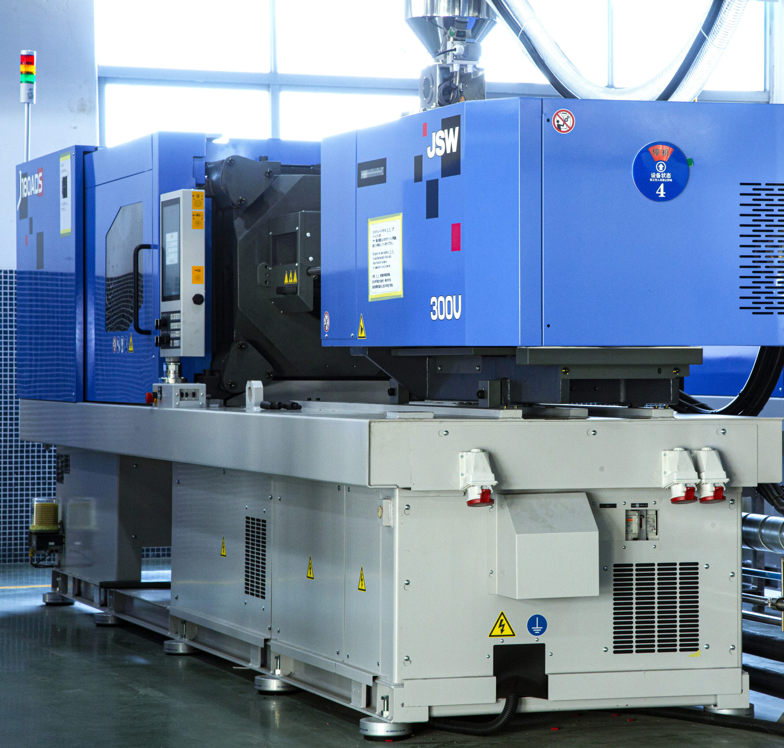 An array of injection machines including vertical press and multi-shot machines. The Manchester, CT office can source & ship resin if not readily available in China.